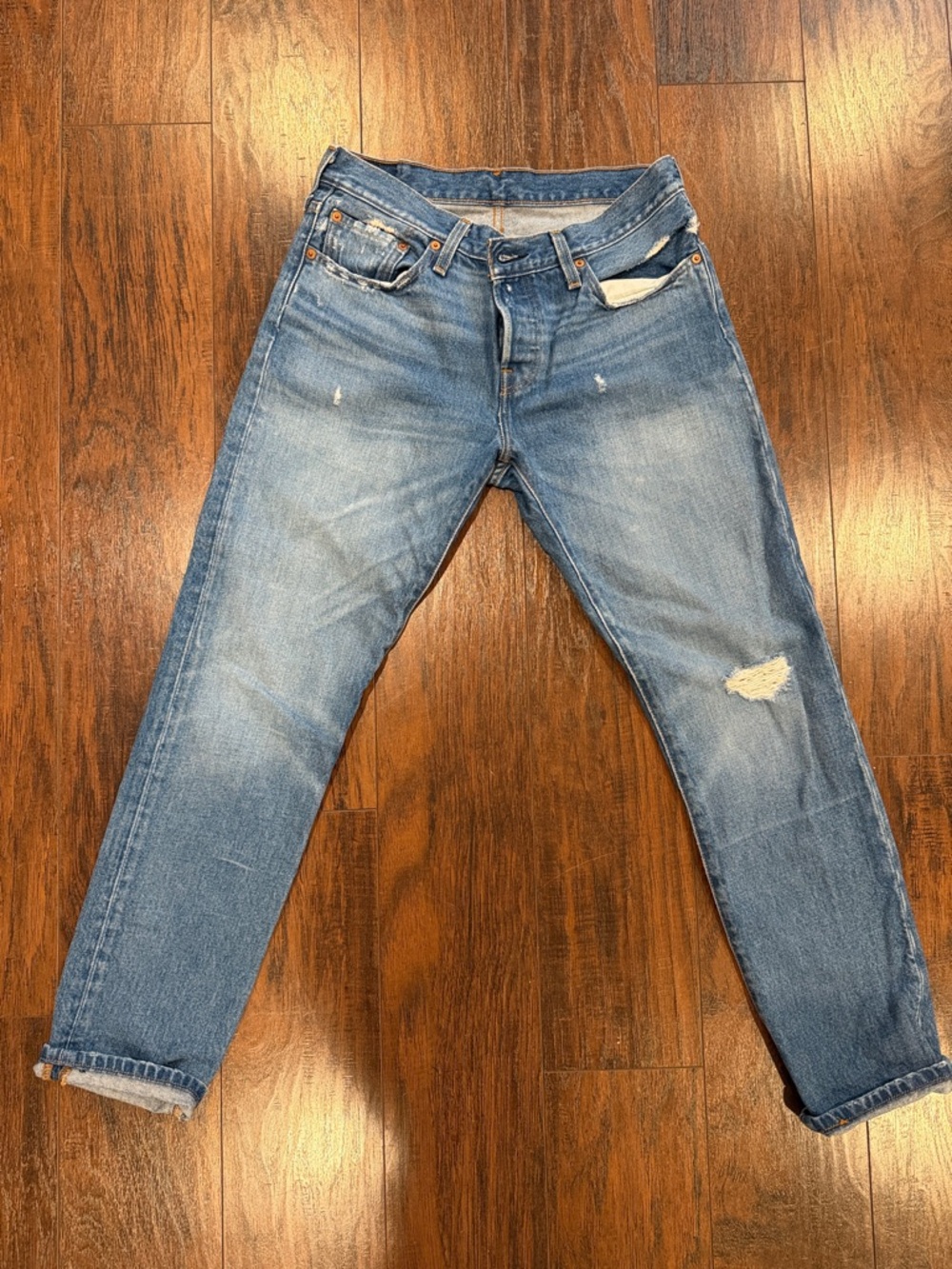 Light Wash Distressed Blue Jeans